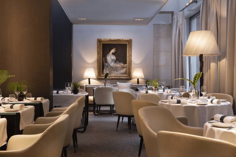 Elegant restaurant with exhibited artworks
